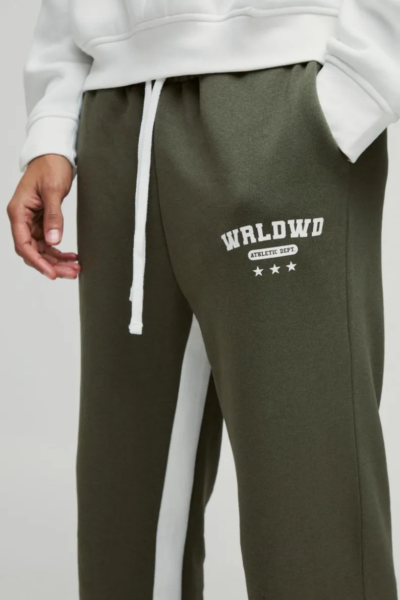 Shop boohooMAN Relaxed Flare Worldwide Star Gusset Jogger khaki