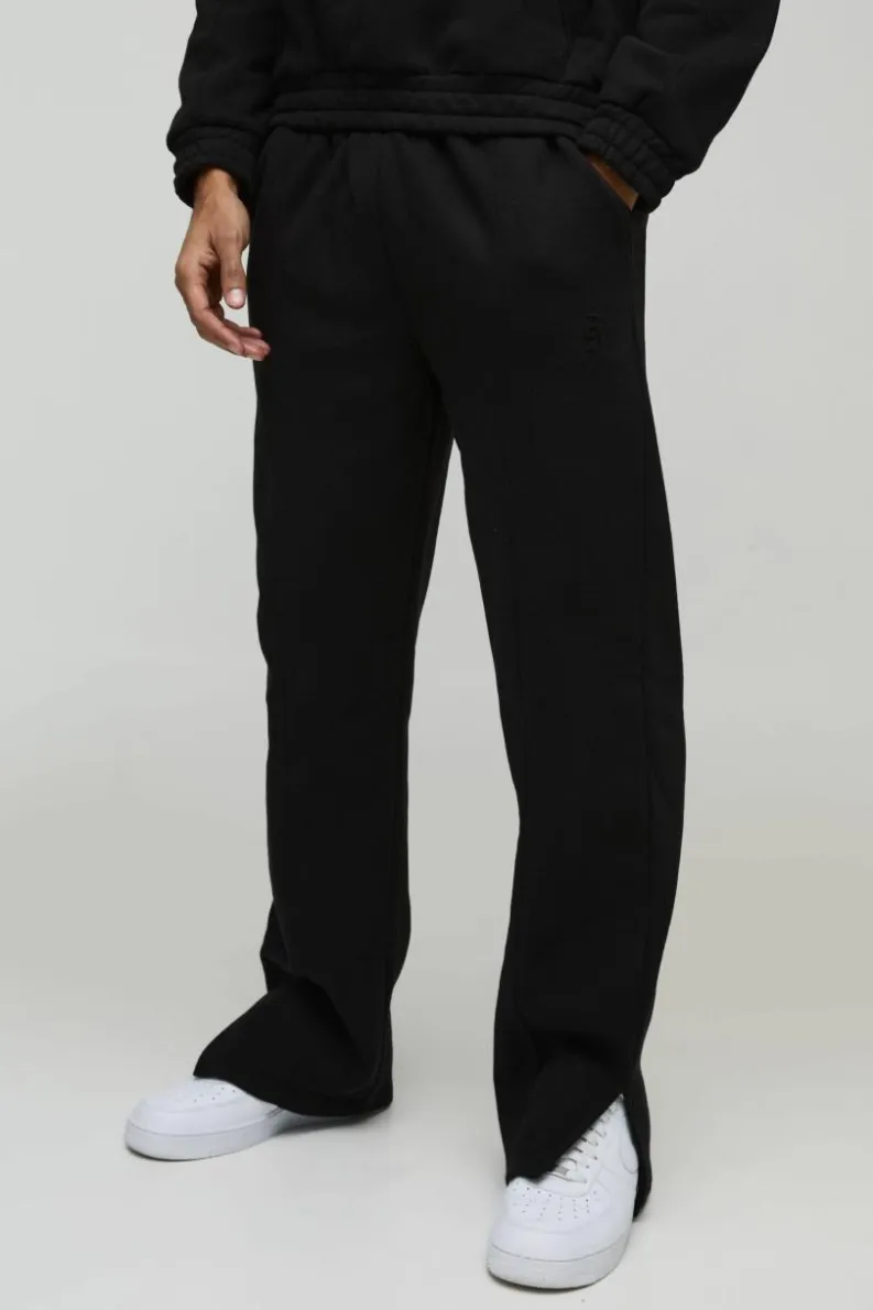 Cheap boohooMAN Relaxed Heavyweight Embossed Pocket Detail Split Hem Joggers black