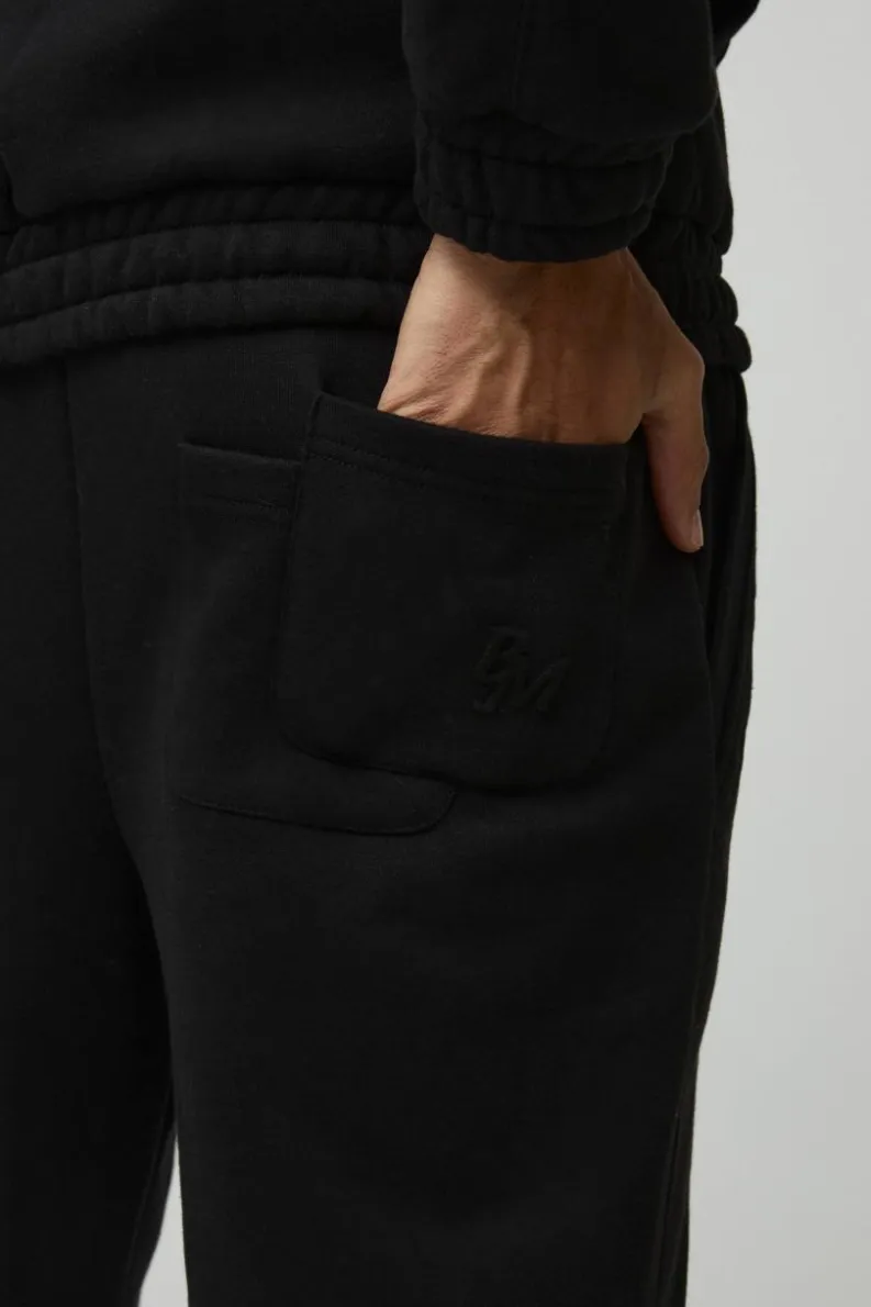 Cheap boohooMAN Relaxed Heavyweight Embossed Pocket Detail Split Hem Joggers black
