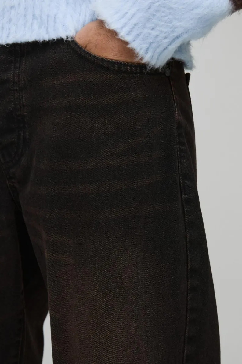 Shop boohooMAN Relaxed Rigid Extreme Washed Jeans washed black