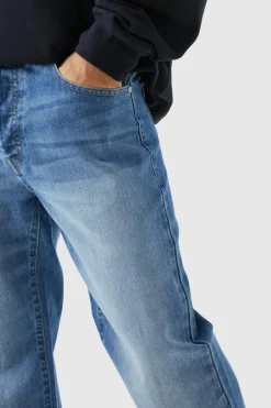Outlet boohooMAN Relaxed Rigid Jean mid blue