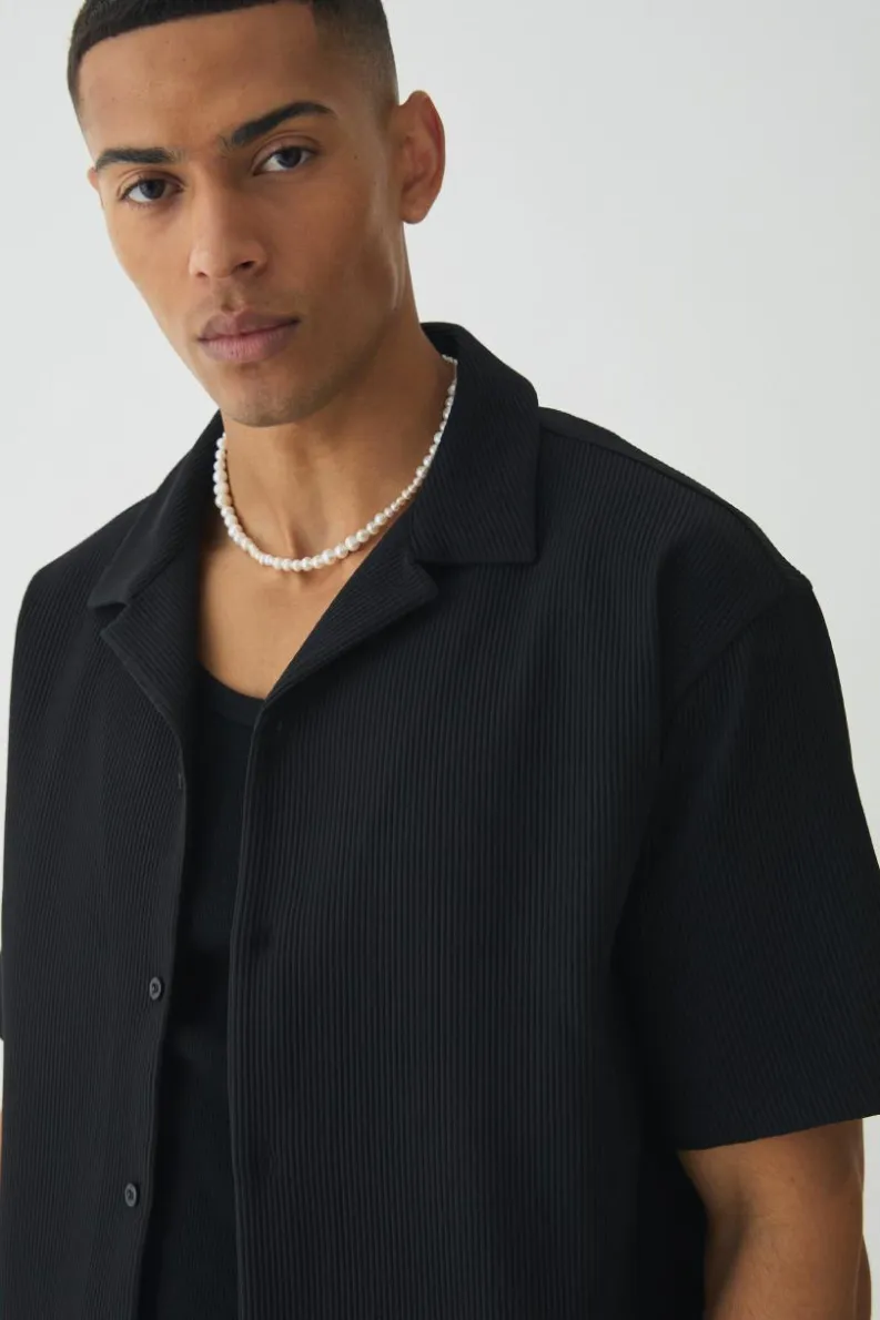 Shop boohooMAN Short Sleeve Revere Oversized Pleated Shirt black