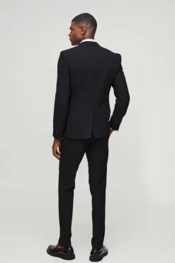 Shop boohooMAN Skinny Suit Trousers black