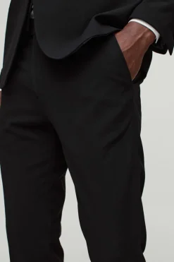 Shop boohooMAN Skinny Suit Trousers black