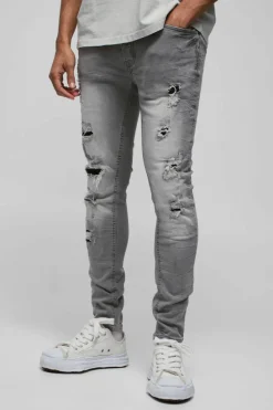 New boohooMAN Skinny Stretch Ripped Jeans In ice grey