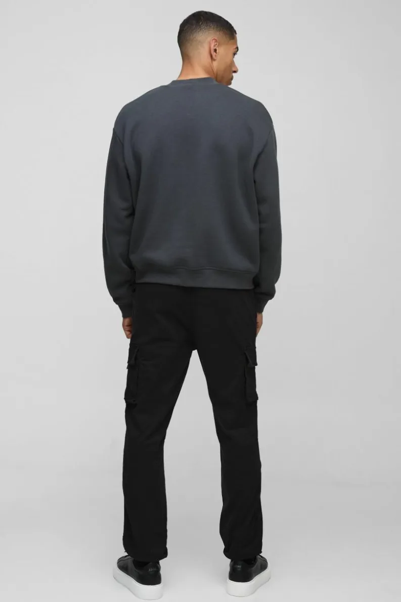 Best Sale boohooMAN Slim Fit Elasticated Waist Woven Tab Cuffed Cargo Trousers black