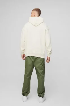Shop boohooMAN Slim Fit Elasticated Waist Woven Tab Cuffed Cargo Trousers khaki