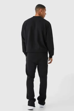 Store boohooMAN Slim Fit Flared Stacked 3d Pocket Jogger black