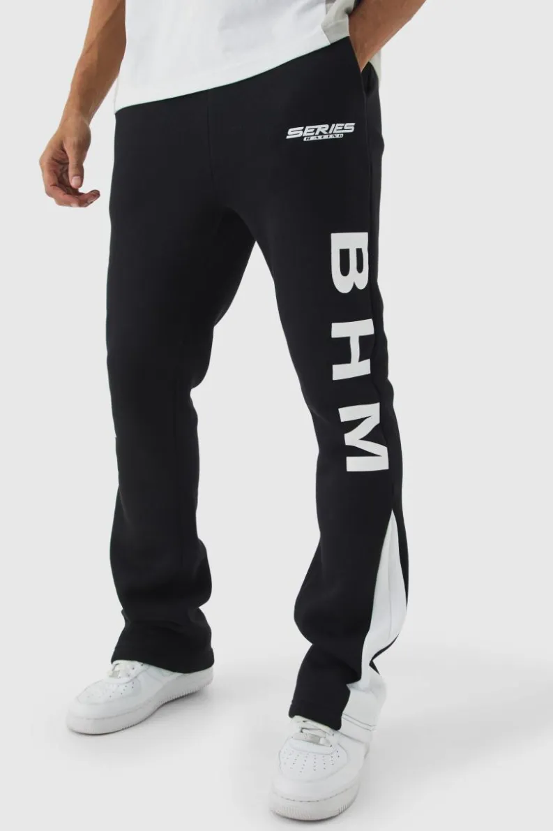 Shop boohooMAN Slim Fit Moto Series Flared Stacked Gusset Jogger black