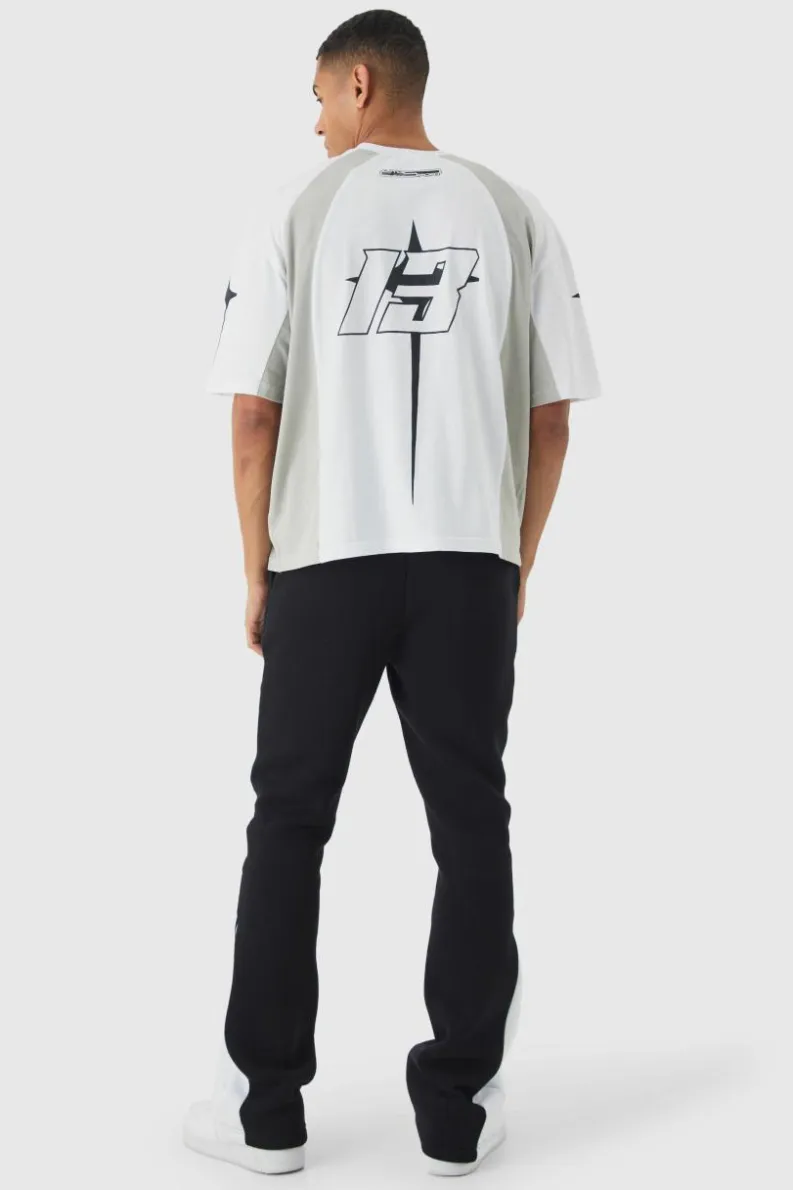 Shop boohooMAN Slim Fit Moto Series Flared Stacked Gusset Jogger black