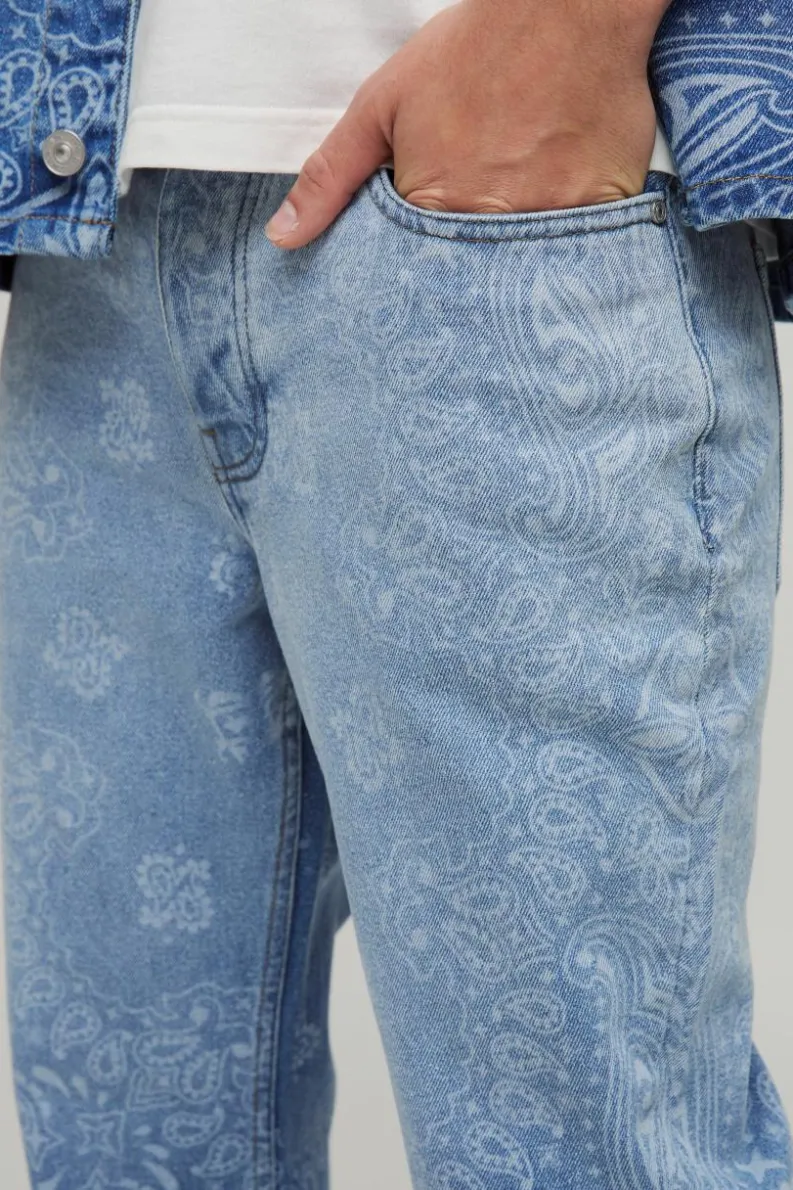Outlet boohooMAN Slim Flared Bandana Laser Print Jeans light blue