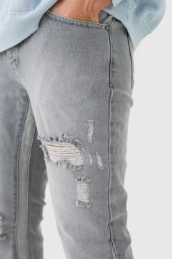 New boohooMAN Slim Flare Distressed Gusset Panel Jeans light grey