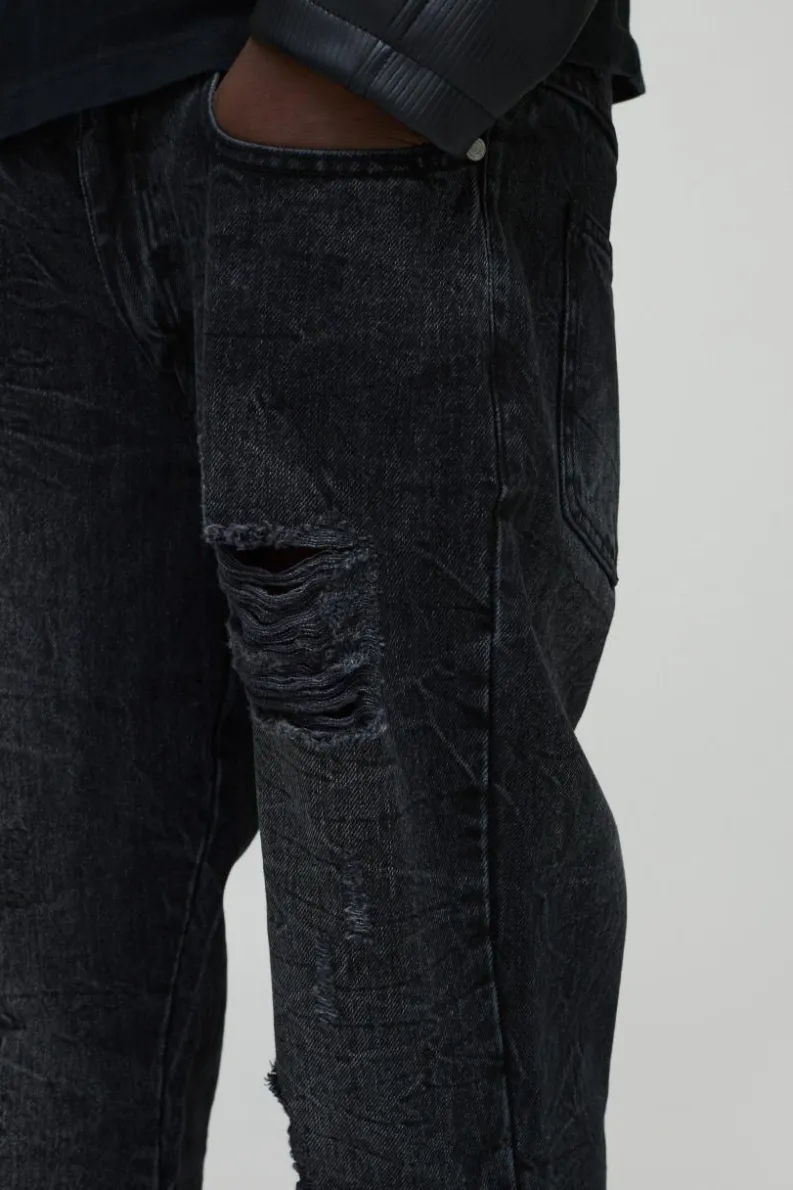 Store boohooMAN Slim Flared Ripped Washed Jeans charcoal