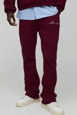 Discount boohooMAN Slim Flare Stacked Man Print Jogger burgundy