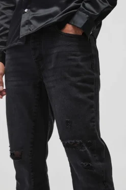 Store boohooMAN Slim Rigid Flare Distressed Gusset Panel Acid Washed Denim Jeans washed black