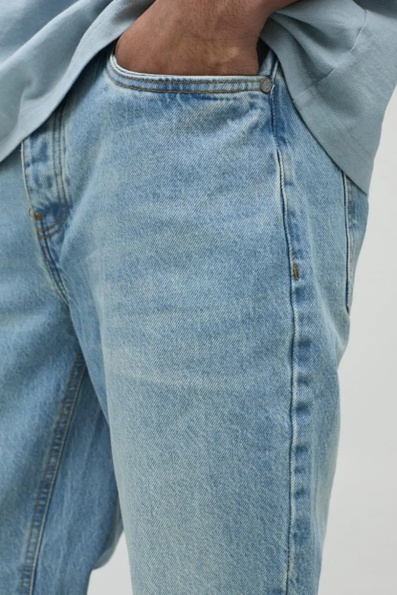 Shop boohooMAN Slim Rigid Flare Jean In antique blue