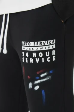 Outlet boohooMAN Slim Stacked Flare Paint Splatter Gusset Jogger black