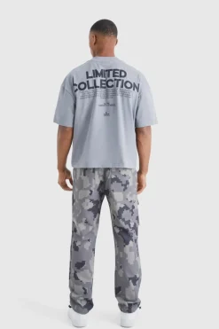 Shop boohooMAN Straight Leg Pixel Camo Cargo Pocket Trouser charcoal