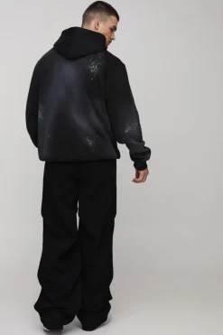 Shop boohooMAN Tall Baggy Ruched Detail Jeans washed black