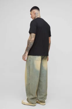 Store boohooMAN Tall Balloon Fit Pleat Knee Tinted Jeans antique wash