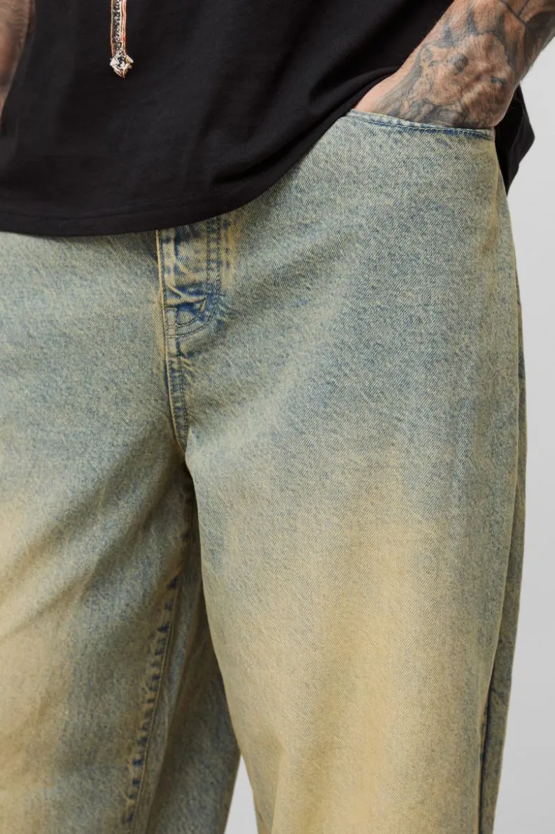 Store boohooMAN Tall Balloon Fit Pleat Knee Tinted Jeans antique wash