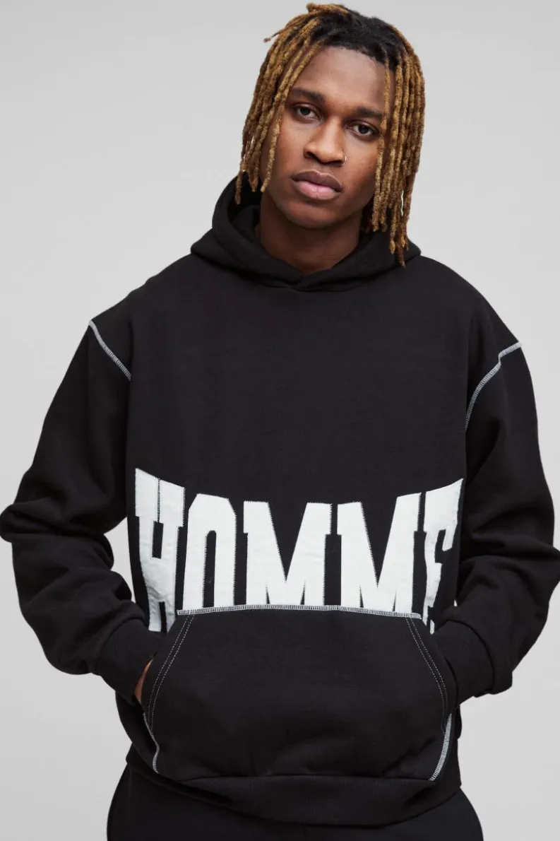 Shop boohooMAN Tall Oversized Boxy Twill Applique Contrast Stitch Hoodie black