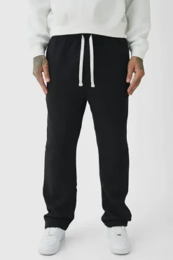 Shop boohooMAN Tall Oversized Drop Crotch Jogger black