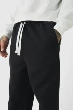 Shop boohooMAN Tall Oversized Drop Crotch Jogger black