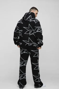 Online boohooMAN Tall Oversized Star All Over Printed Gusset Flare Hooded Tracksuit black