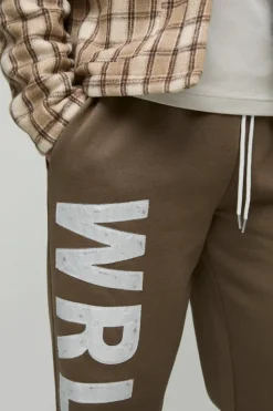Hot boohooMAN Tall Relaxed Satin Applique WRLDWD Jogger brown