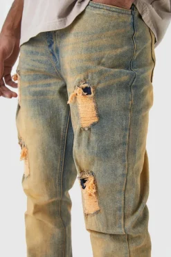 Discount boohooMAN Tall Slim Flare Stretch Multi Rip & Repair Jeans antique wash