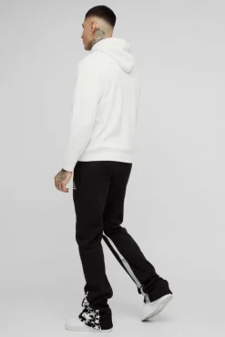 Best boohooMAN Tall Slim Stacked Flare Star Print Gusset Jogger black
