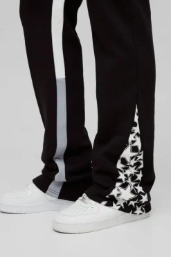 Best boohooMAN Tall Slim Stacked Flare Star Print Gusset Jogger black