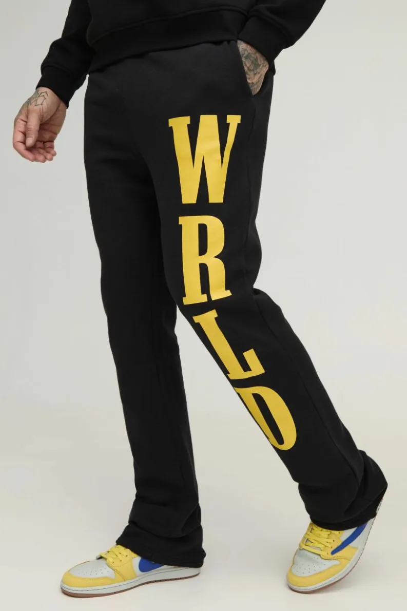 Shop boohooMAN Tall Slim Stacked Wrld Print Gusset Jogger black
