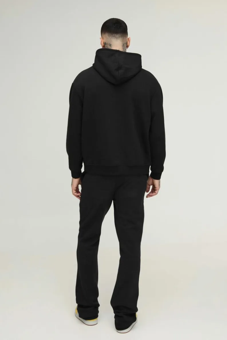 Shop boohooMAN Tall Slim Stacked Wrld Print Gusset Jogger black