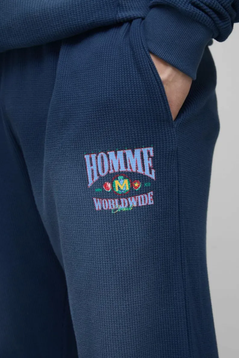 Fashion boohooMAN Tall Spray Wash Waffle Graphic Oversized Jogger navy