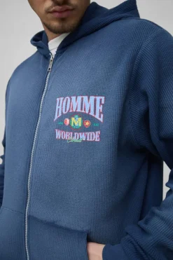Shop boohooMAN Tall Spray Wash Waffle Graphic Zip Up Hoodie navy