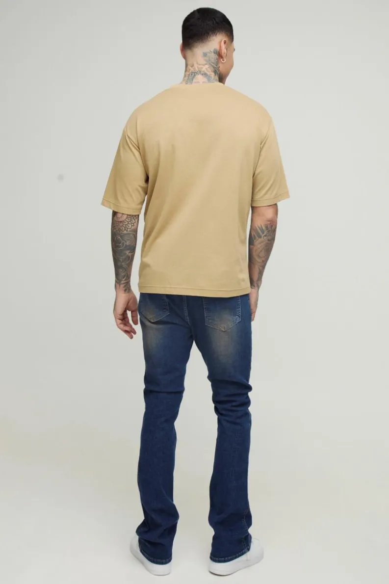 Store boohooMAN Tall Stretch Skinny Seam Detail Flared Jeans mid blue