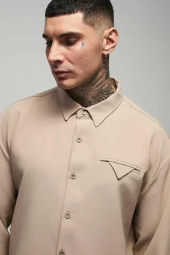 Shop boohooMAN Tall Stretch Woven Pocket Detail Oversized Shirt stone