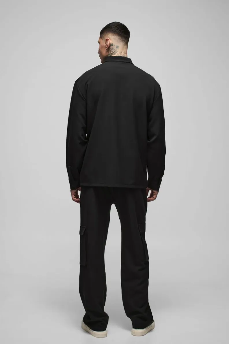 Shop boohooMAN Tall Stretch Woven Pocket Detail Oversized Shirt black