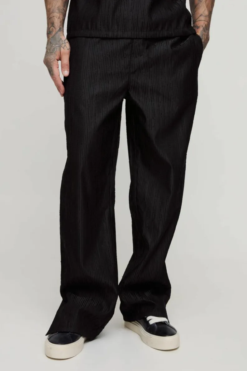 New boohooMAN Tall Woven Rib Texture Split Hem Relaxed Fit Trousers black