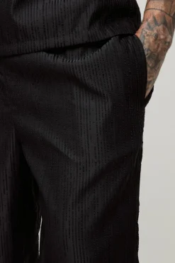 New boohooMAN Tall Woven Rib Texture Split Hem Relaxed Fit Trousers black
