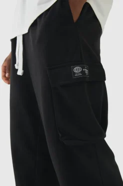 Online boohooMAN Tall Woven Tab Oversized Fit Cargo Joggers black
