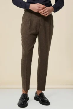 Shop boohooMAN Tapered Fit Herringbone Suit Trousers brown