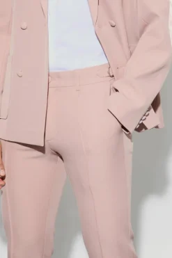 Shop boohooMAN Textured Adjustable Waist Skinny Suit Trousers pink