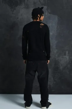 Shop boohooMAN Trippie Redd Relaxed Rigid Panel Denim Jeans washed black