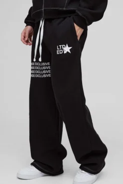 Shop boohooMAN Wide Leg Contrast Stitch Printed Joggers black